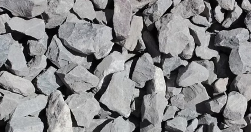 Ash grey crushed rock, sized for hardscaping installs