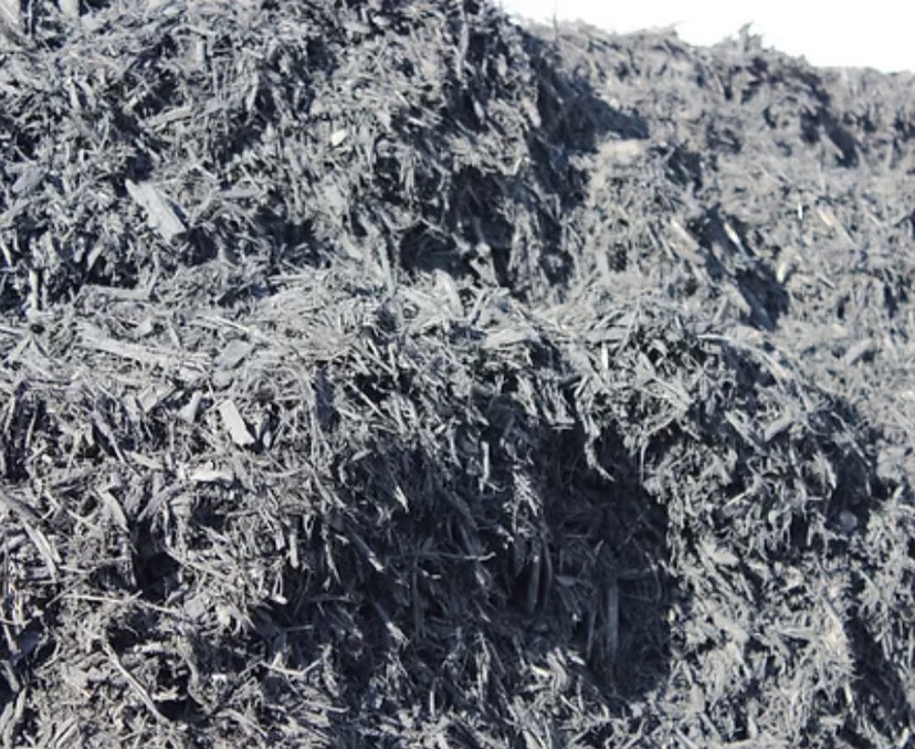 Black bark mulch texture close up